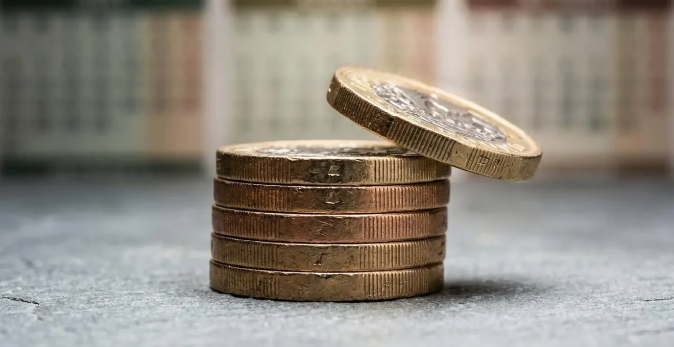 Macro close-up showing the precise moment of investment allocation symbolizing time-in-market advantage
